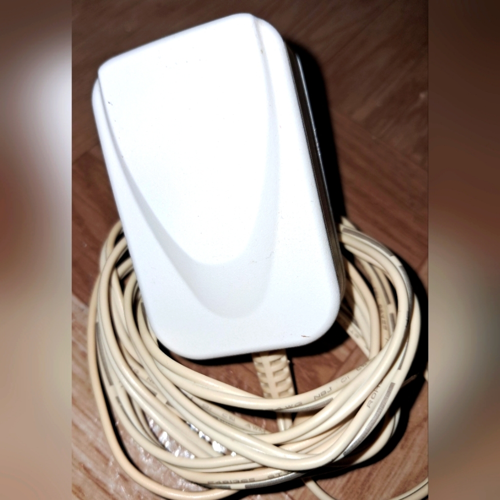 FREE with PURCHASE. SWITCHING ADAPTER MODEL SUN- 0900070
